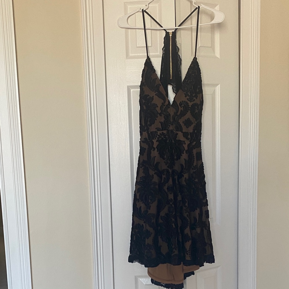 le chateau Black Lace over Nude Mini Dress with V-Neck